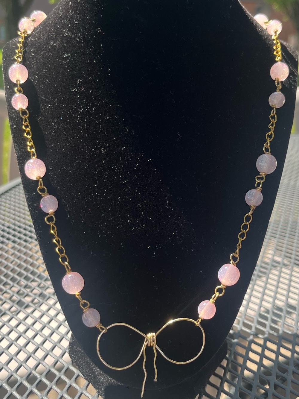 Hand Crafted Necklace with Gold Bow Pendant